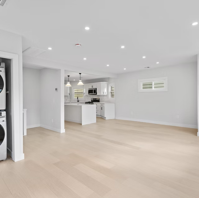 Open plan living area with utility space