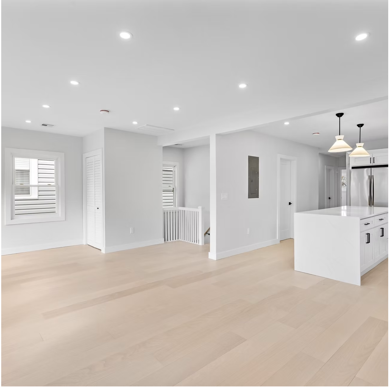 Open plan living space with kitchen island in Maidstone