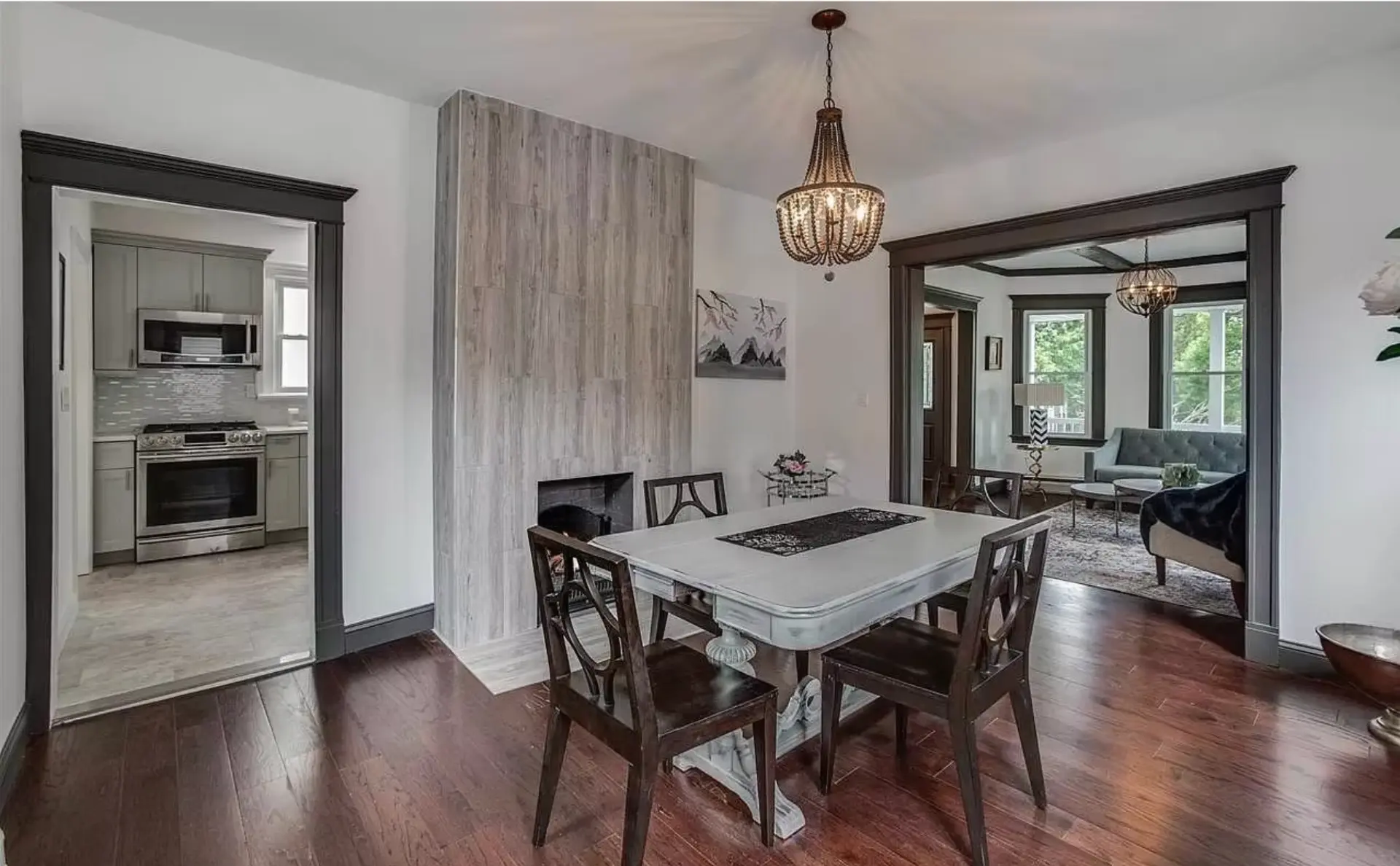 Dining room open through to the kitchen and front reception