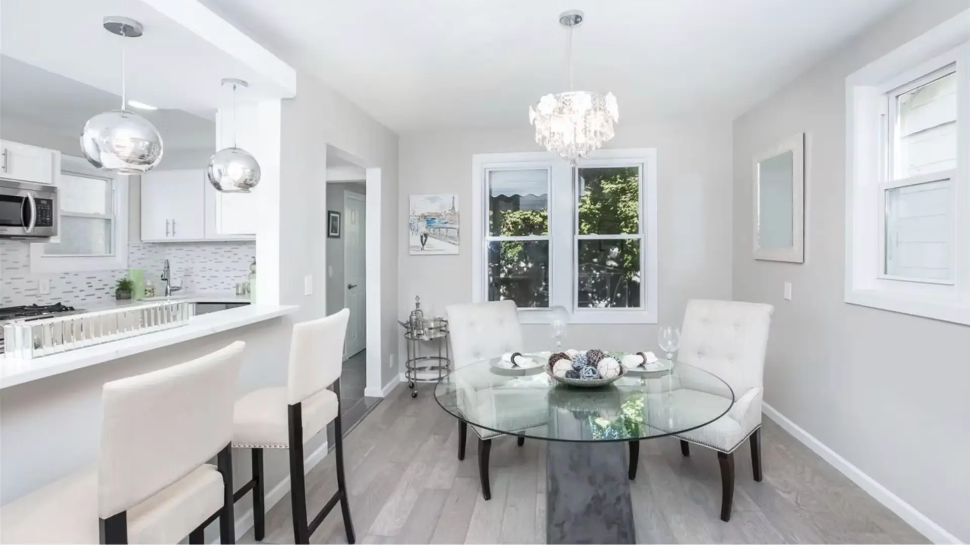 Dining area with breakfast bar open to the new kitchen