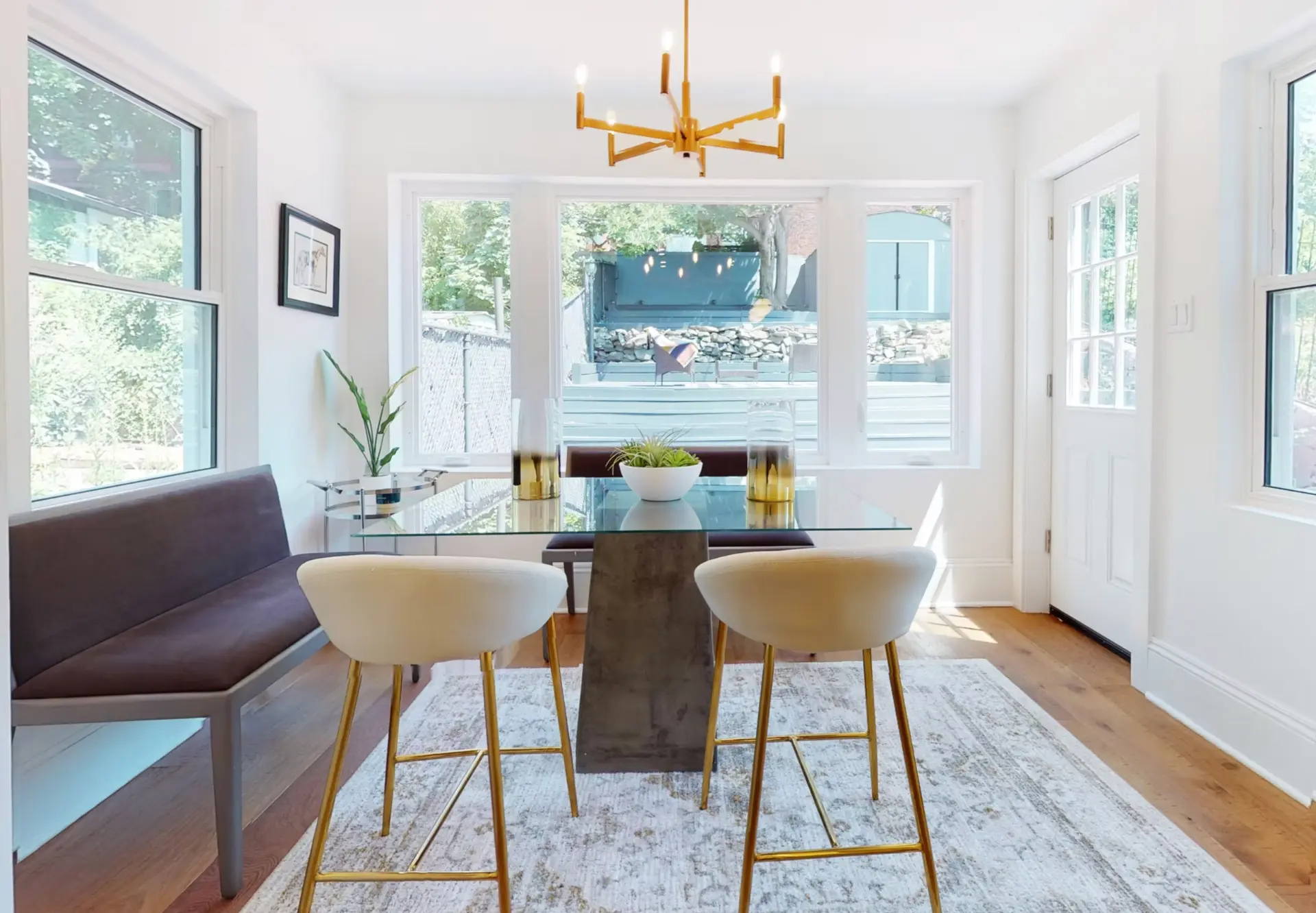 Dining area with bay window looking onto the rebuilt garden terrace