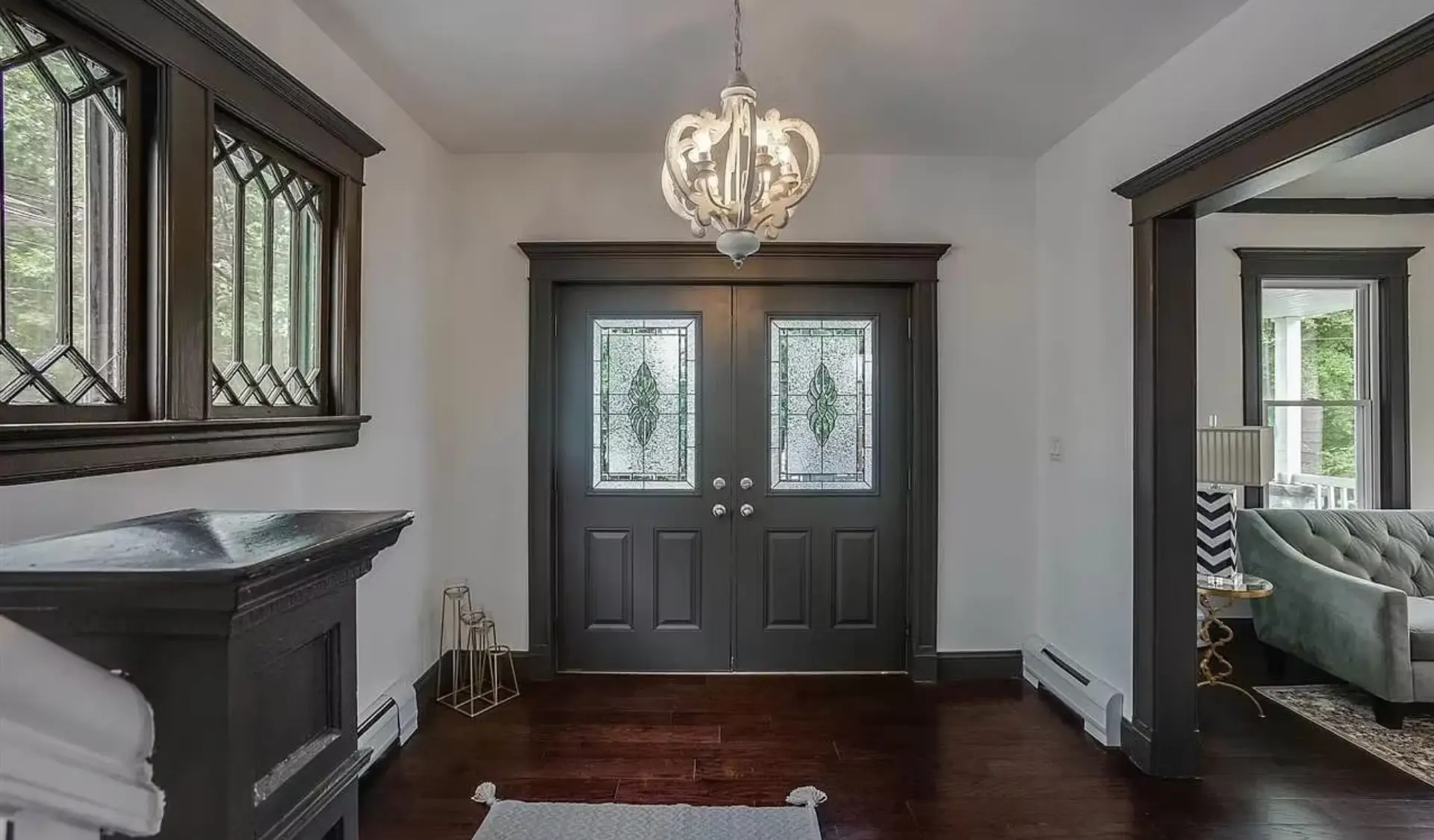 Entrance vestibule with leaded glazing and panelled front doors